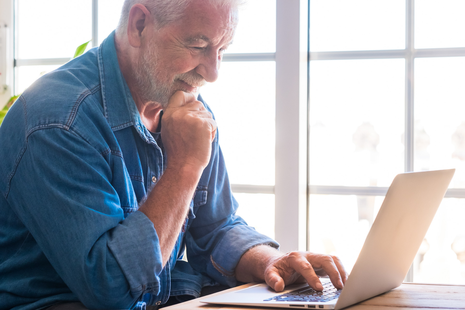 pensive-senior-man-with-a-white-beard-smiles-looki-tm4uep6.jpg